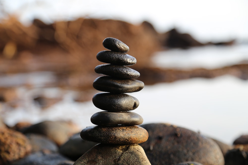 stones stacked up on a beach